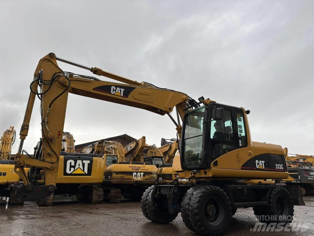 CAT M 313 C Gumikerekes kotrók