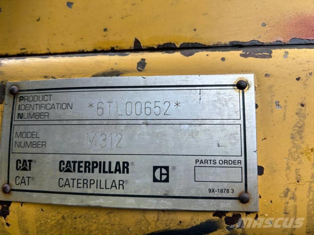 CAT M 312 Gumikerekes kotrók