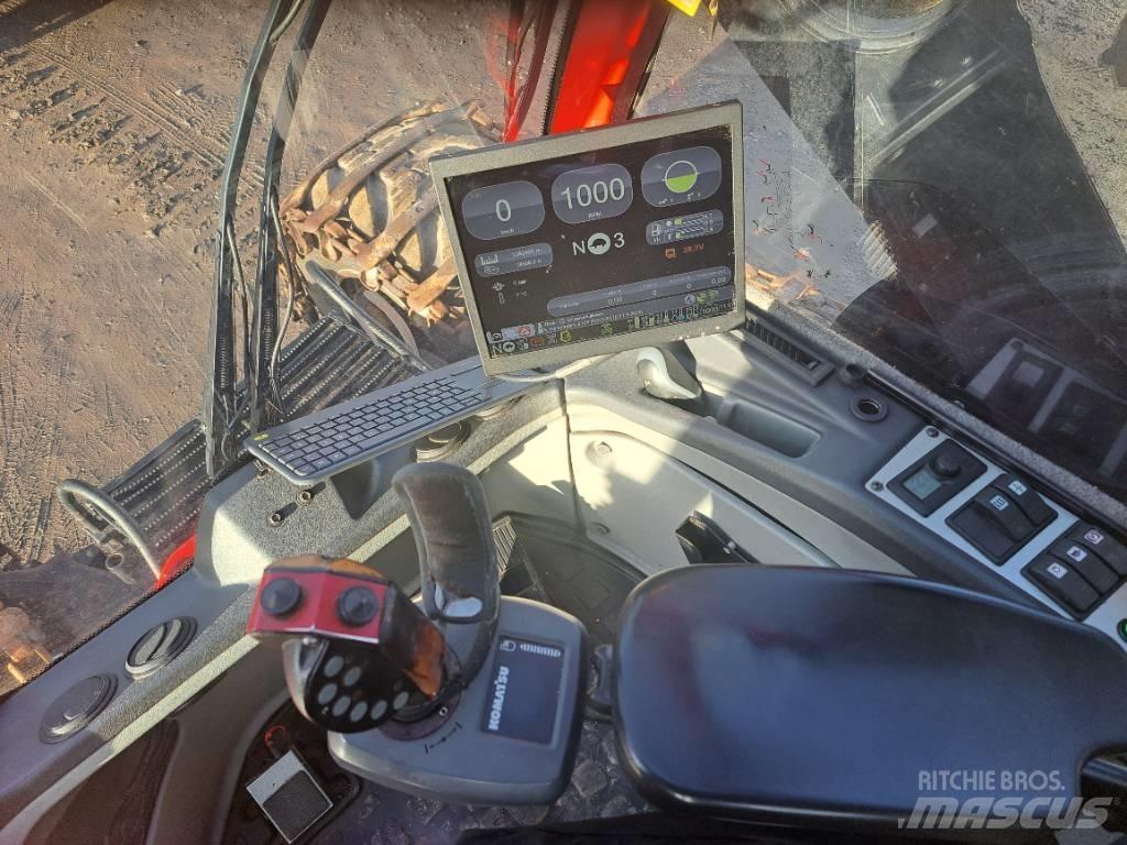 Komatsu 931 Betakarítók