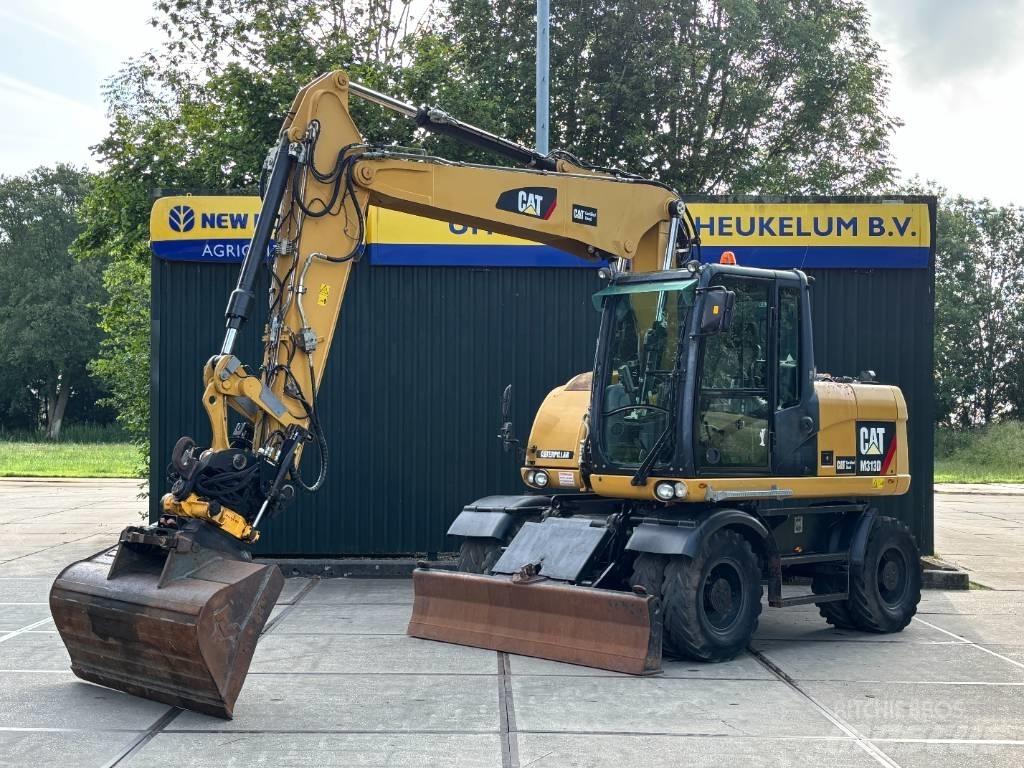 CAT M 313 D Gumikerekes kotrók