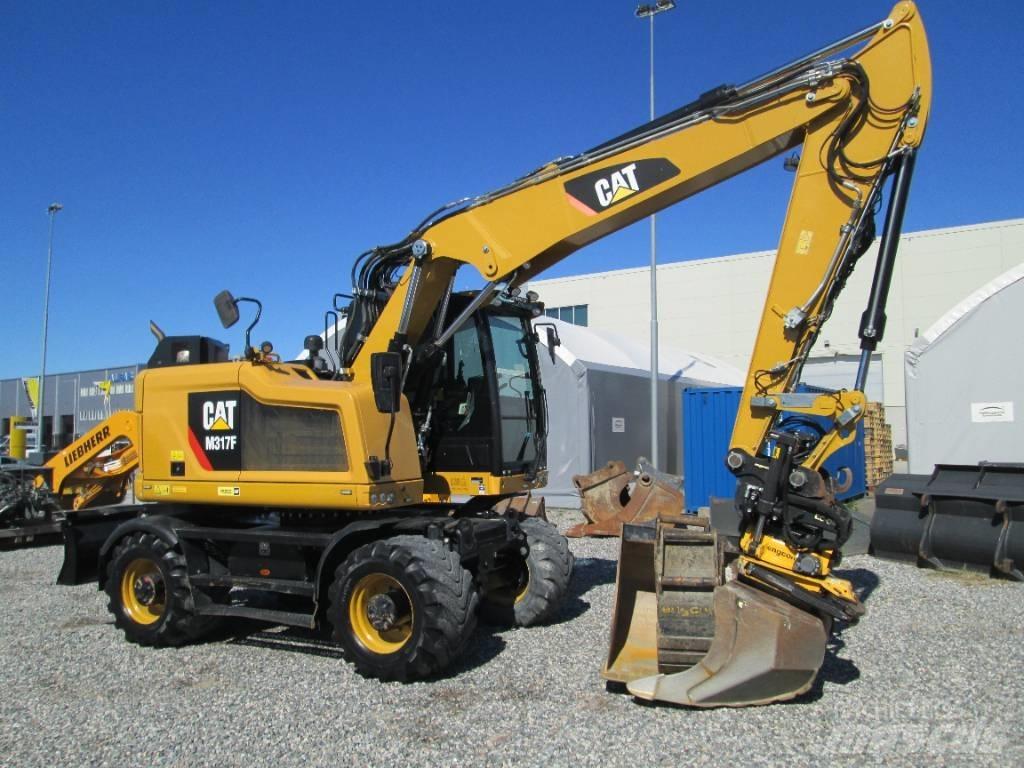 CAT M 317F Gumikerekes kotrók
