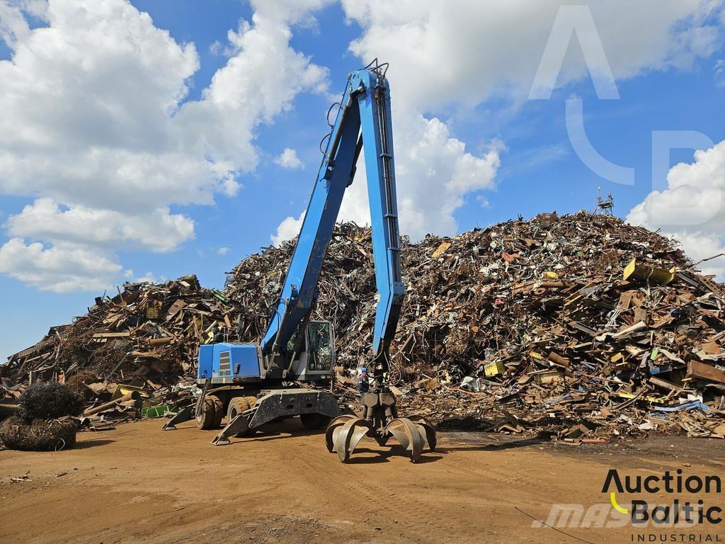 Fuchs MHL 350 Gumikerekes kotrók