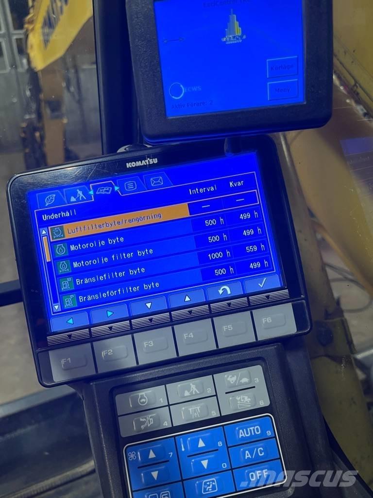 Komatsu PW 160 Gumikerekes kotrók