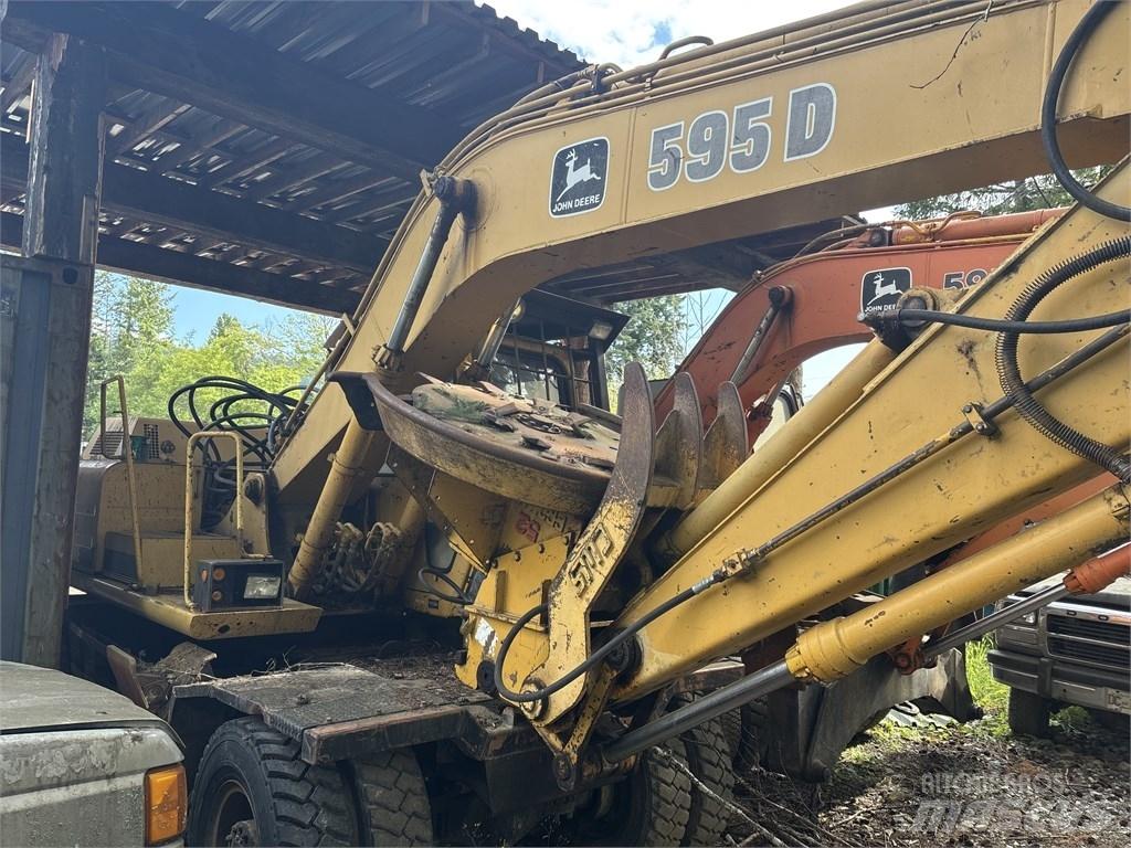 DEERE 595D Gumikerekes kotrók