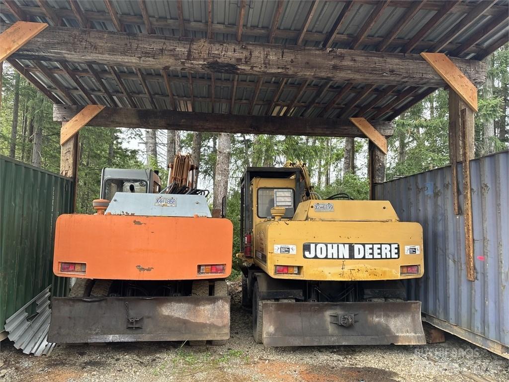 DEERE 595D Gumikerekes kotrók
