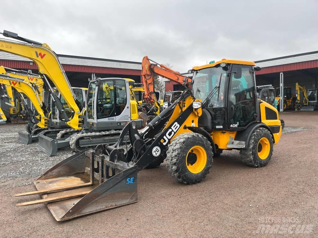 JCB 406 - Uthyres Gumikerekes homlokrakodók