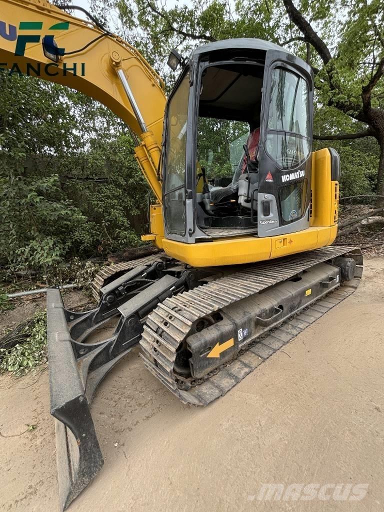 Komatsu PC128US Lánctalpas kotrók