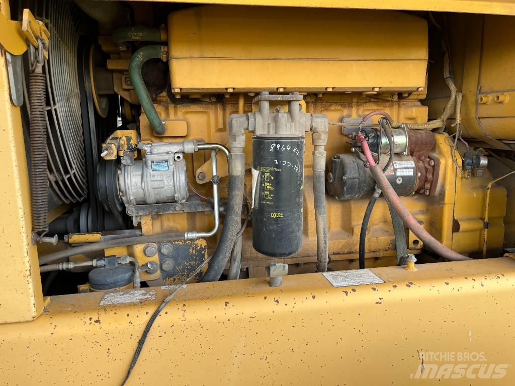 John Deere 770 BH Gréderek