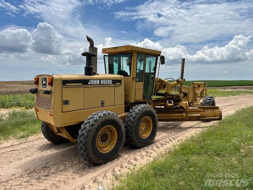John Deere 770 BH Gréderek