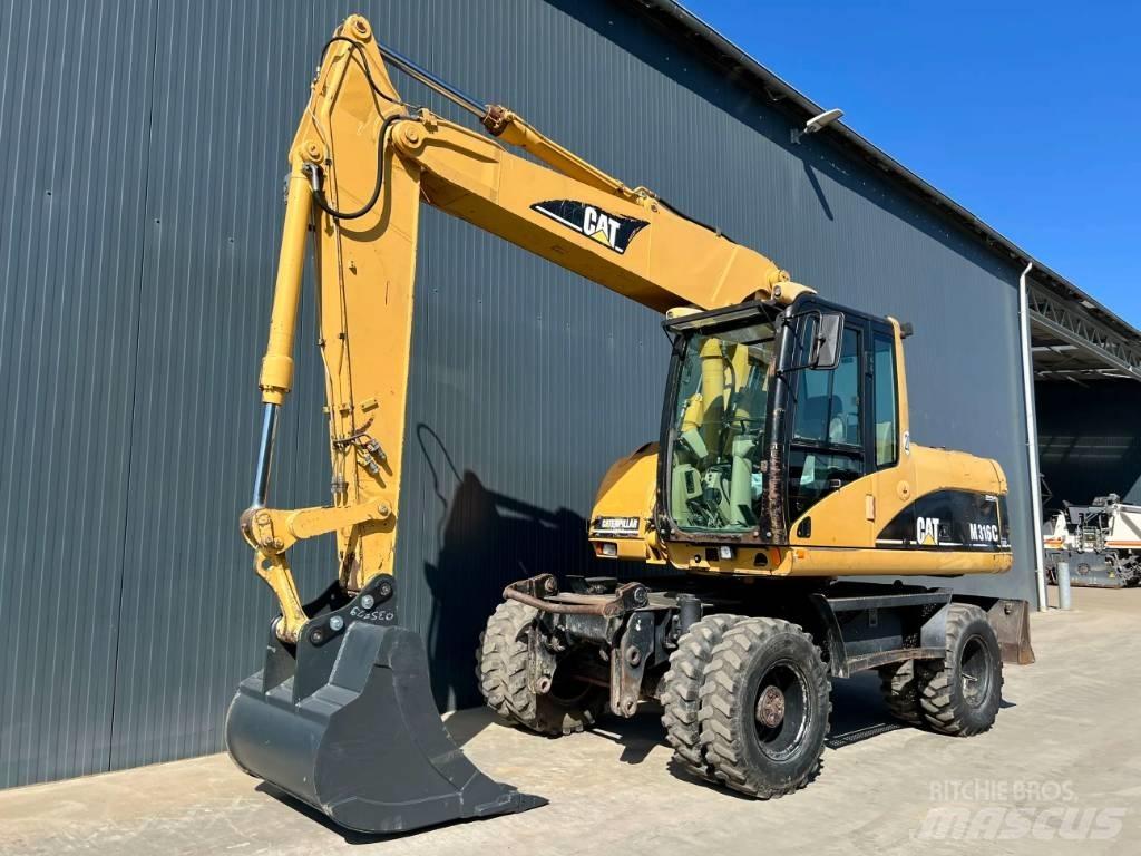 CAT M316C Gumikerekes kotrók
