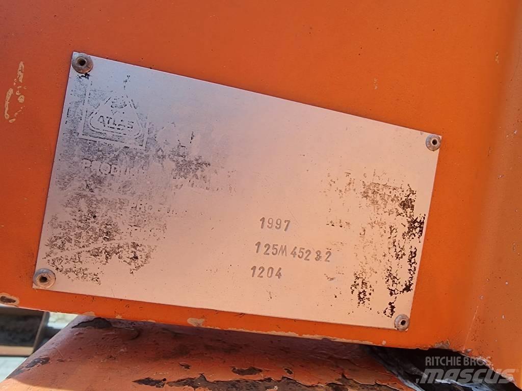 Atlas 1204 Gumikerekes kotrók
