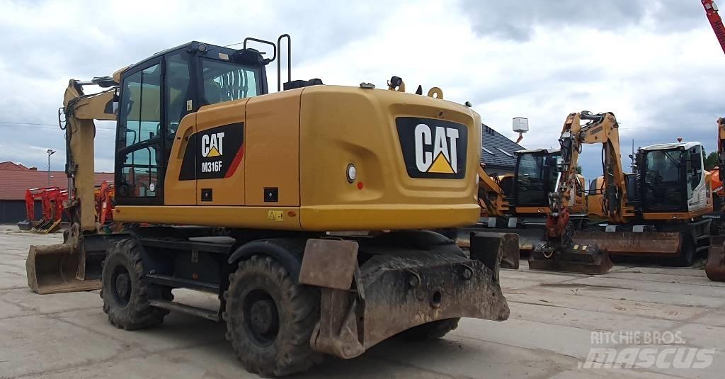 CAT M316F Gumikerekes kotrók