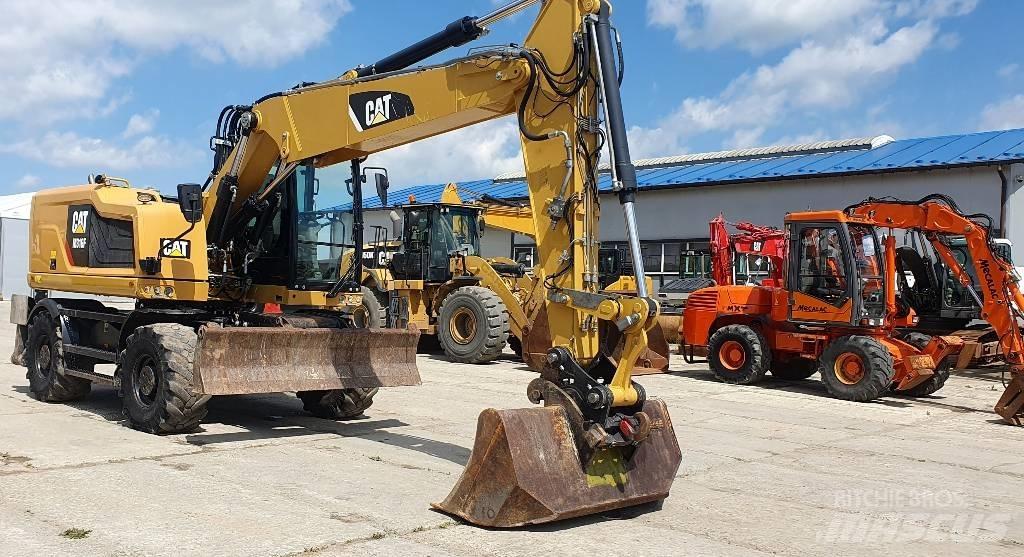 CAT M316F Gumikerekes kotrók