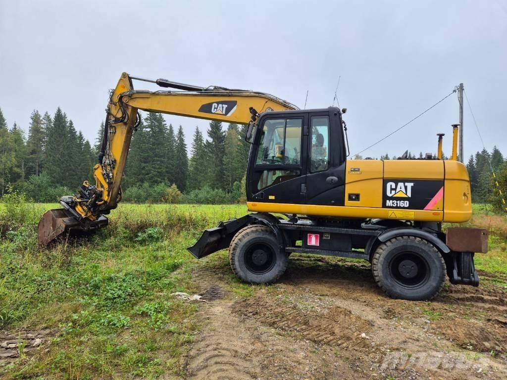CAT M 316 D Gumikerekes kotrók