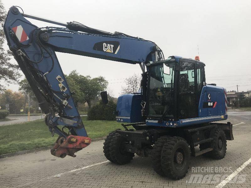 CAT M318F Gumikerekes kotrók