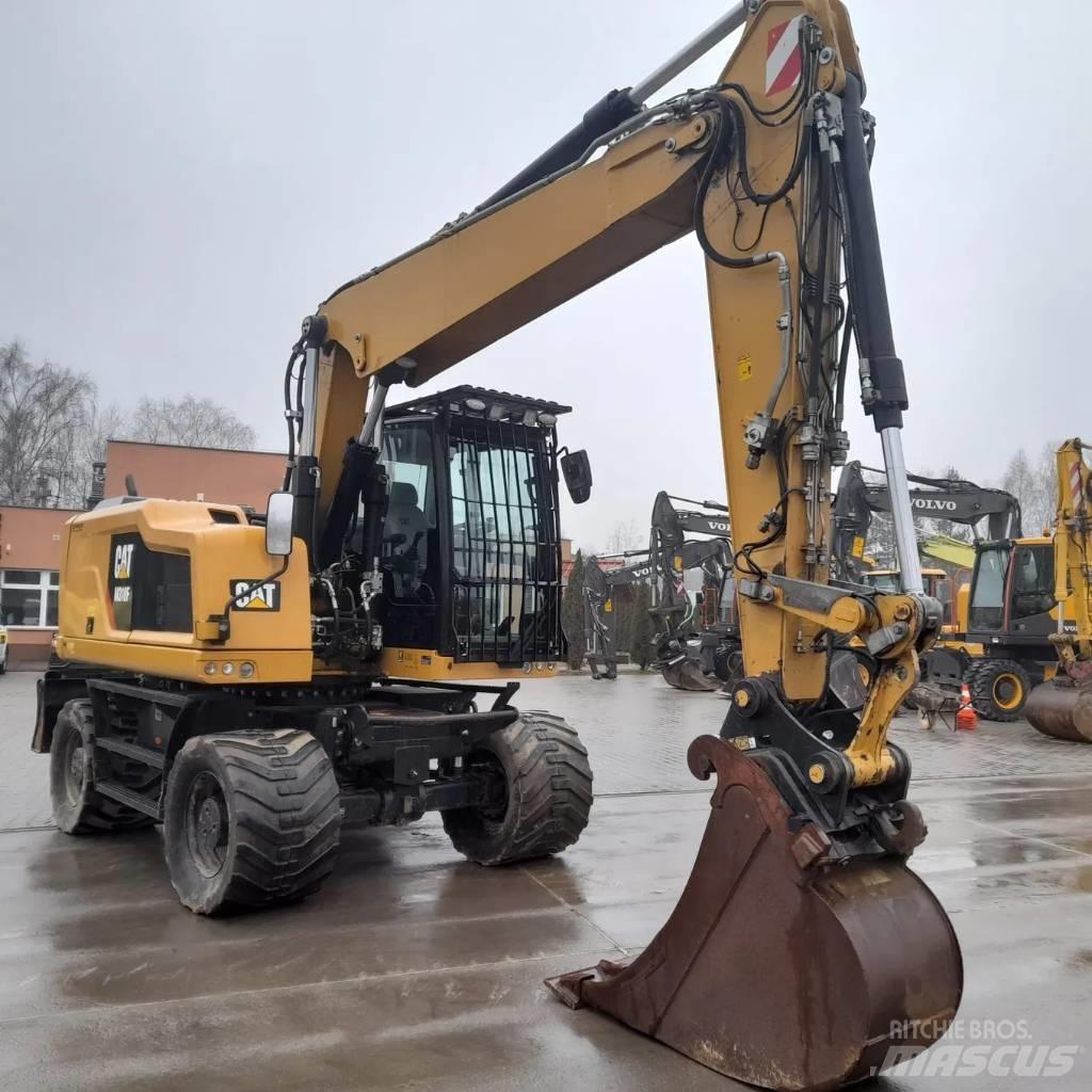 CAT M 318 F Gumikerekes kotrók
