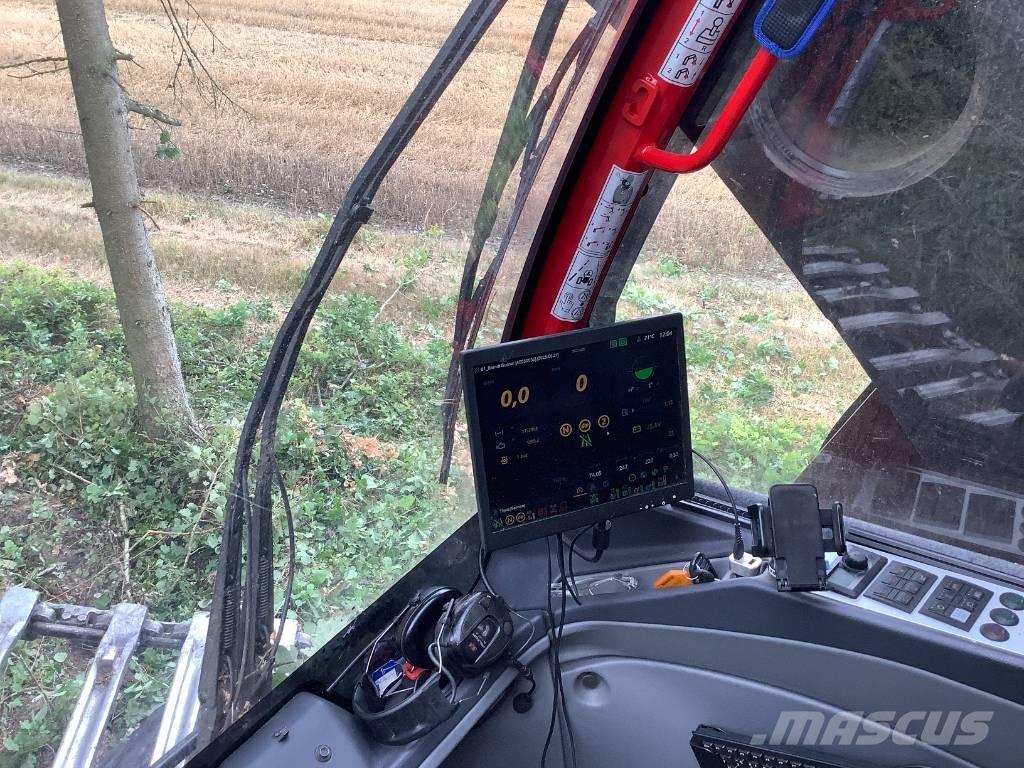 Komatsu 951 Betakarítók