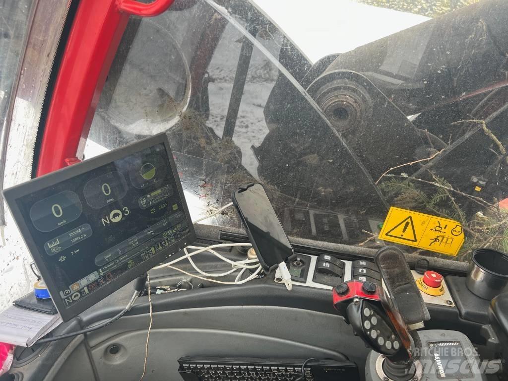 Komatsu 951 Betakarítók
