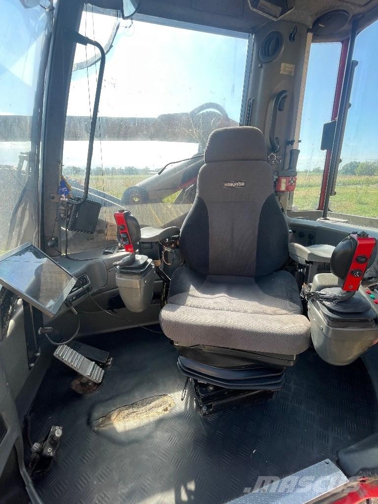 Komatsu 931 Betakarítók