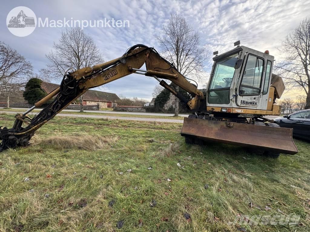 Liebherr A 310 B Gumikerekes kotrók