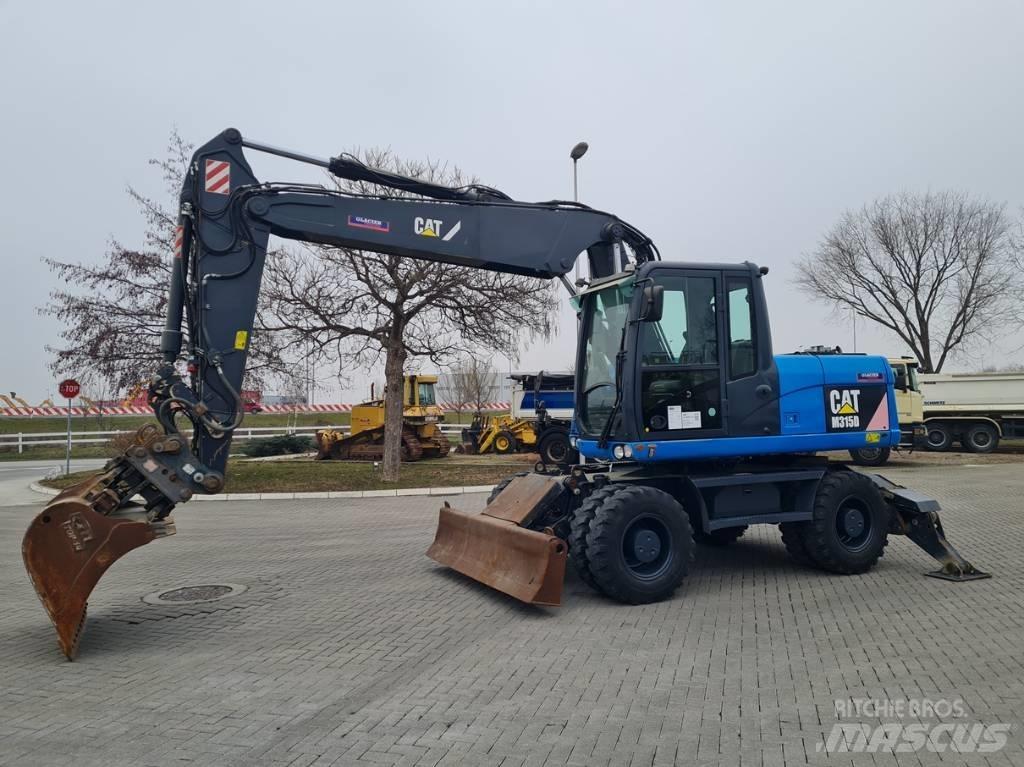 CAT M315D 2 buckets Gumikerekes kotrók