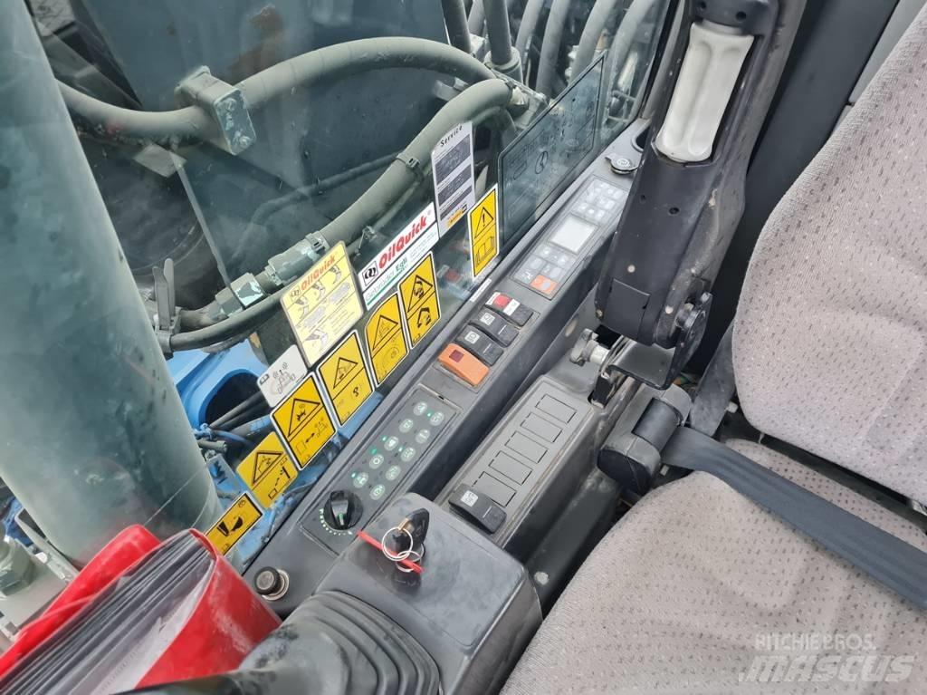 CAT M315D 2 buckets Gumikerekes kotrók