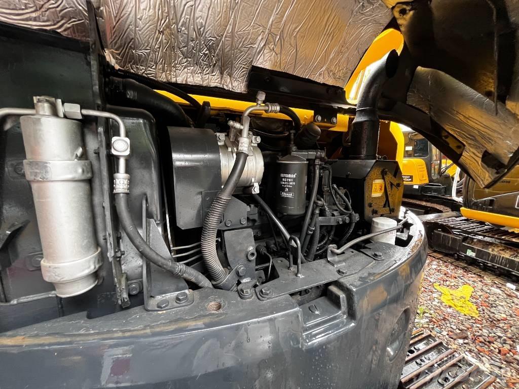 Komatsu PC 78 US Közepes (midi) kotrók 7 t - 12 t