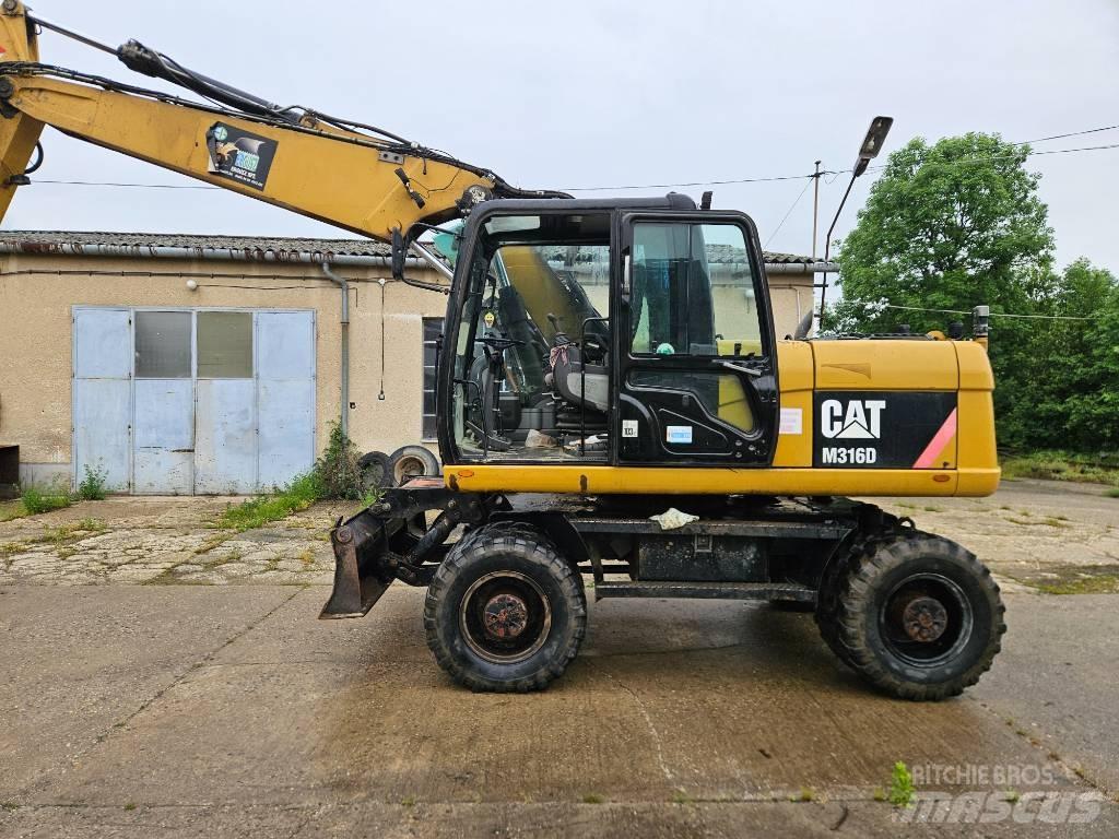 CAT M 316 D Gumikerekes kotrók