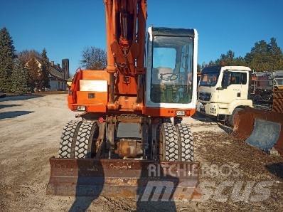 Atlas 1604 Gumikerekes kotrók
