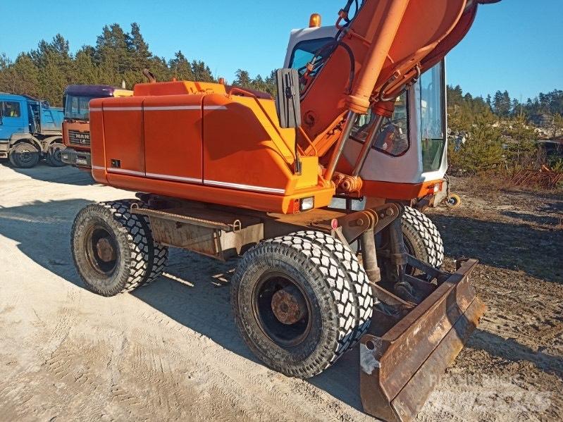 Atlas 1604 Gumikerekes kotrók
