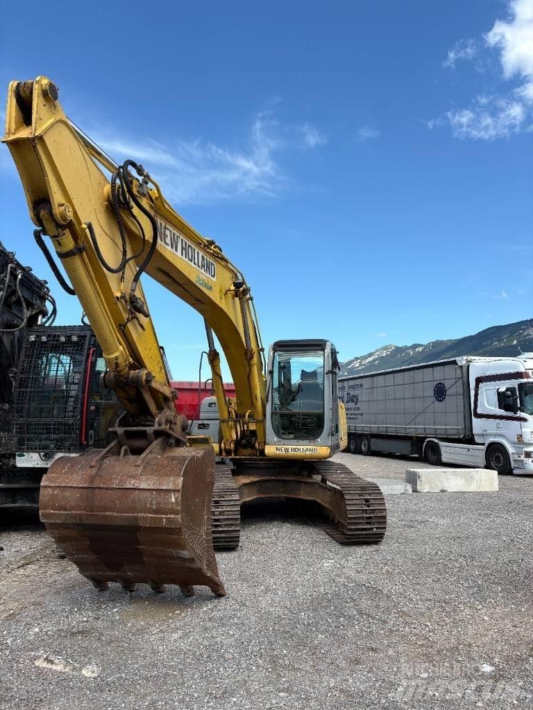 New Holland E 245 B Lánctalpas kotrók