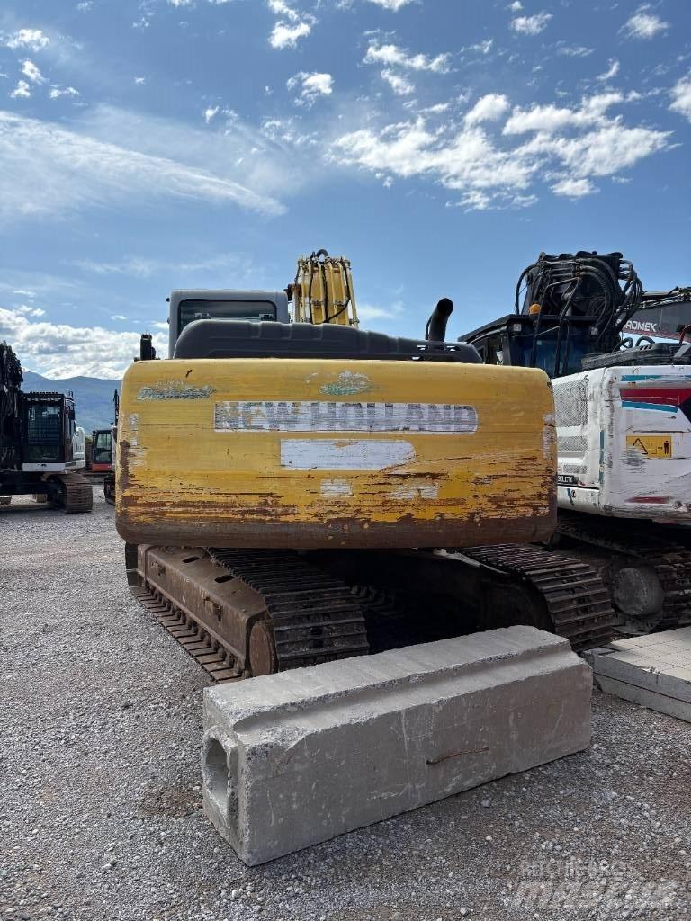 New Holland E 245 B Lánctalpas kotrók