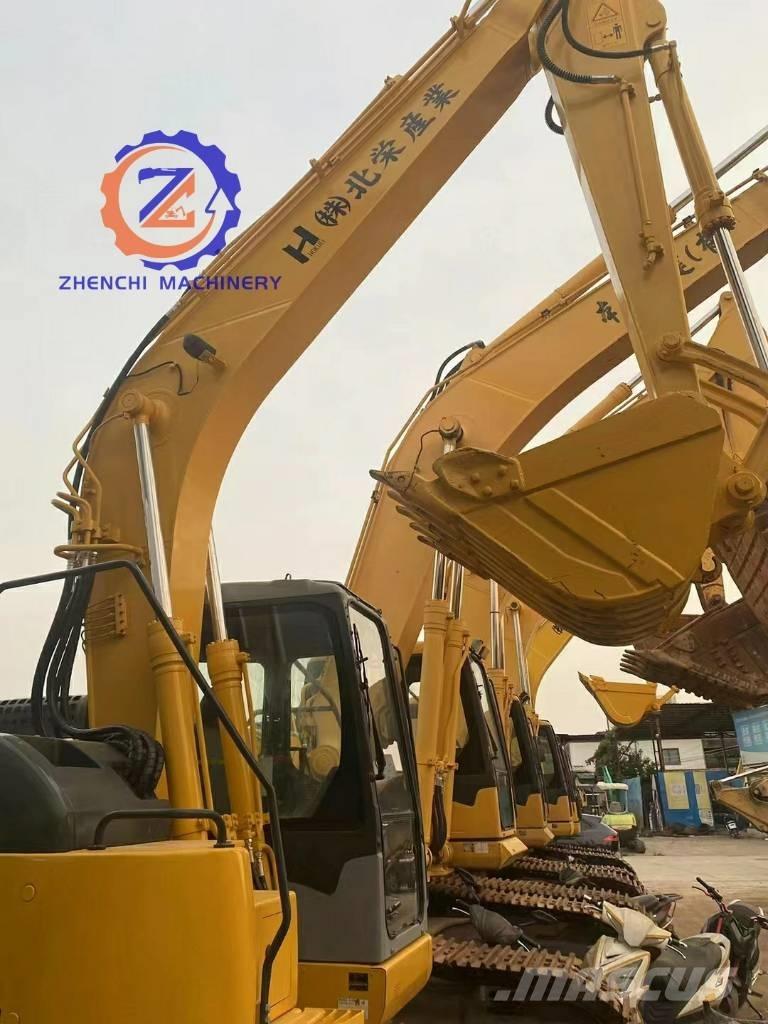 Komatsu PC 128 US Közepes (midi) kotrók 7 t - 12 t