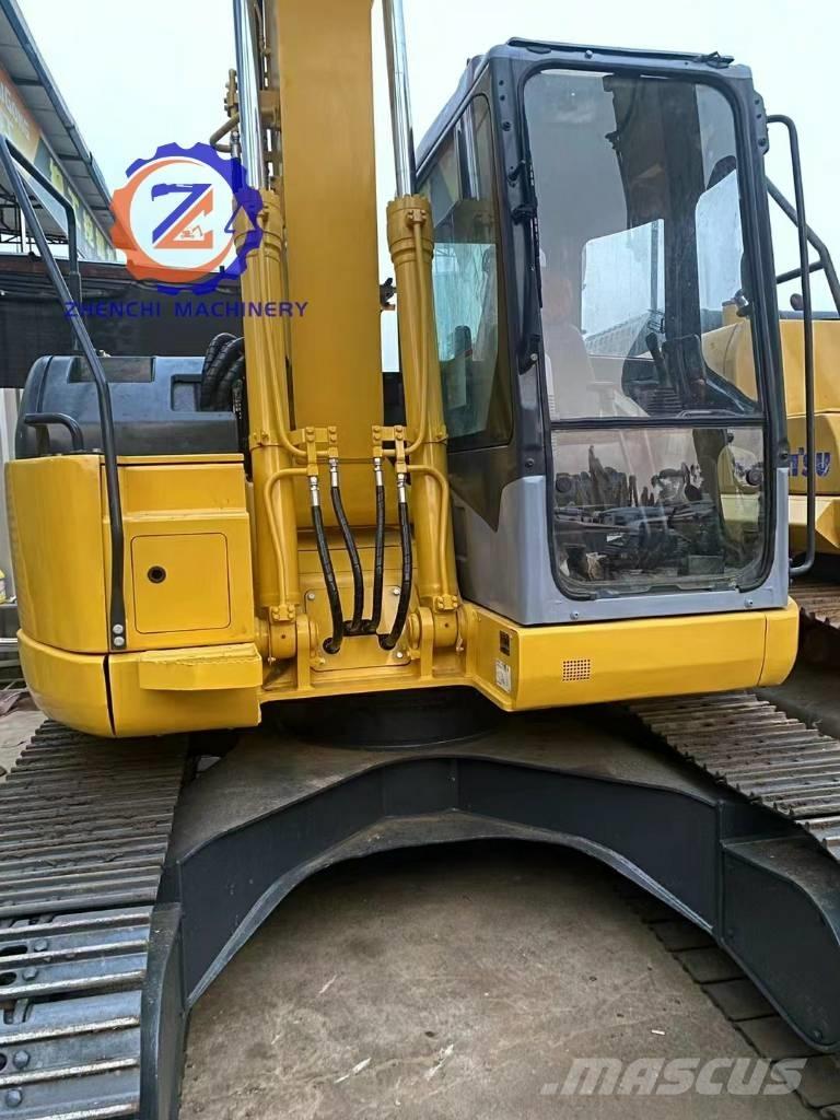Komatsu PC 128 US Közepes (midi) kotrók 7 t - 12 t