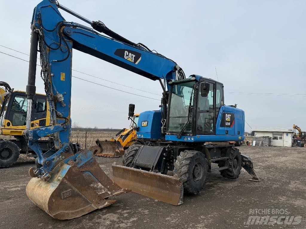 CAT M 318 F Gumikerekes kotrók
