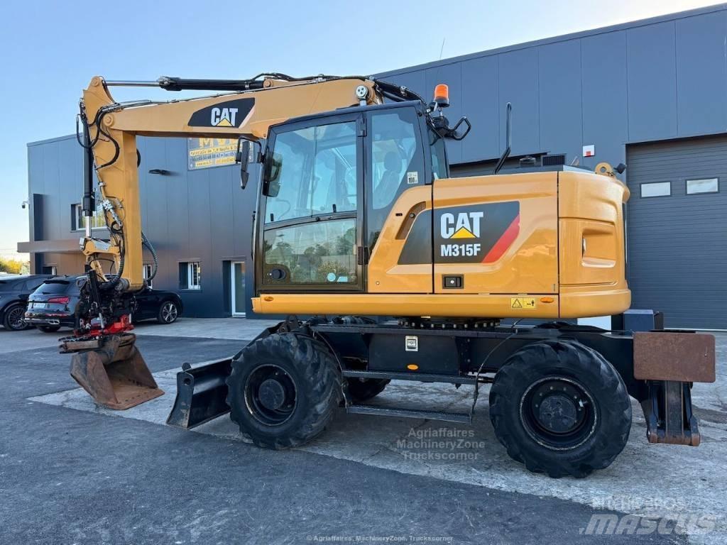 CAT M315F Gumikerekes kotrók