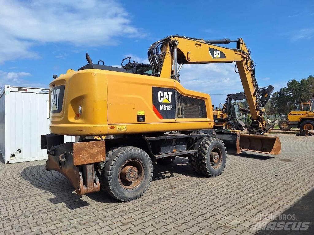 CAT M 318 F Gumikerekes kotrók