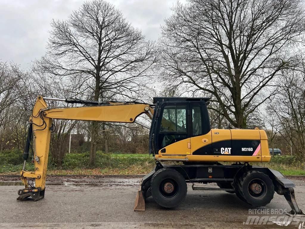 CAT M316D Gumikerekes kotrók