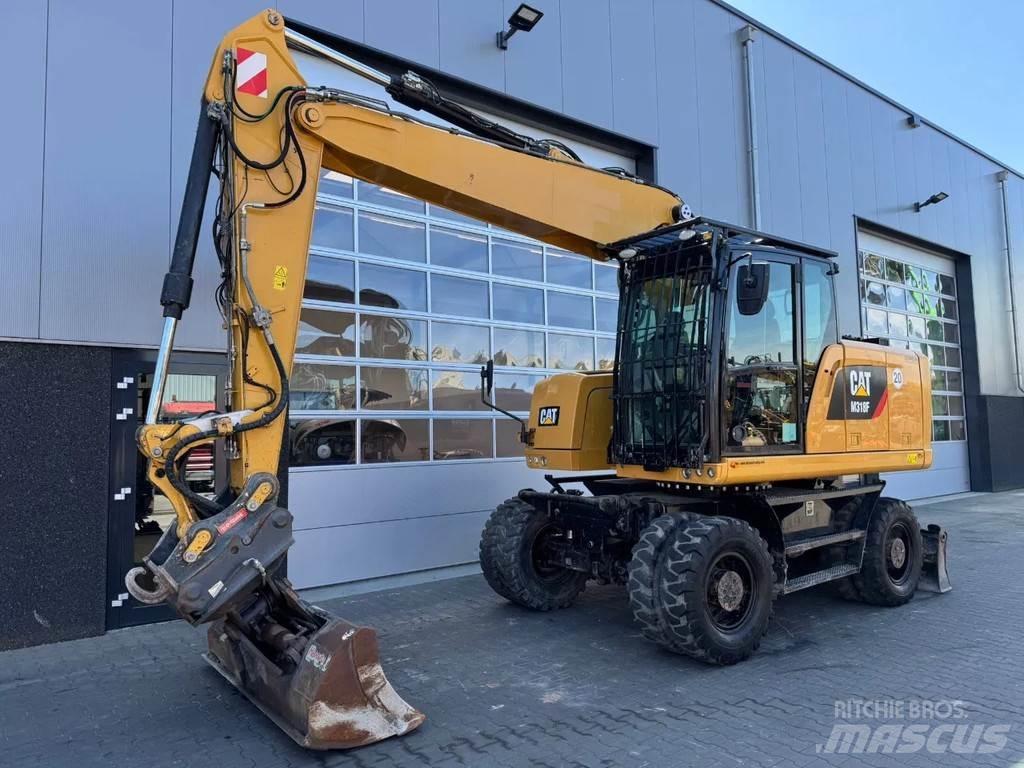 CAT M318F Gumikerekes kotrók