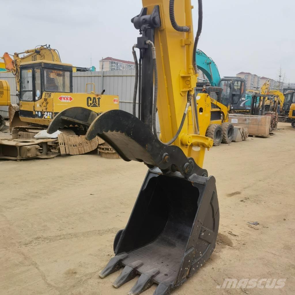 Komatsu PC78US Közepes (midi) kotrók 7 t - 12 t