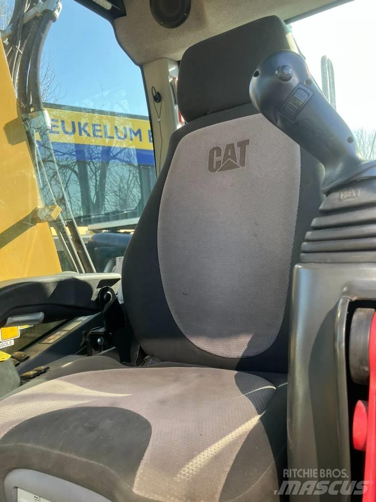 CAT M314F Gumikerekes kotrók