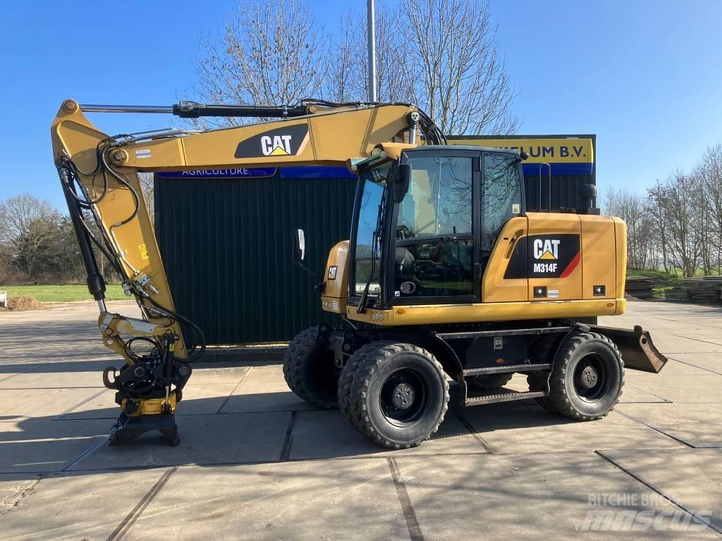 CAT M314F Gumikerekes kotrók