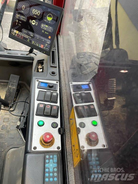 Komatsu 931.2 Betakarítók
