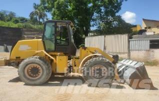 New Holland 12 D Gumikerekes homlokrakodók