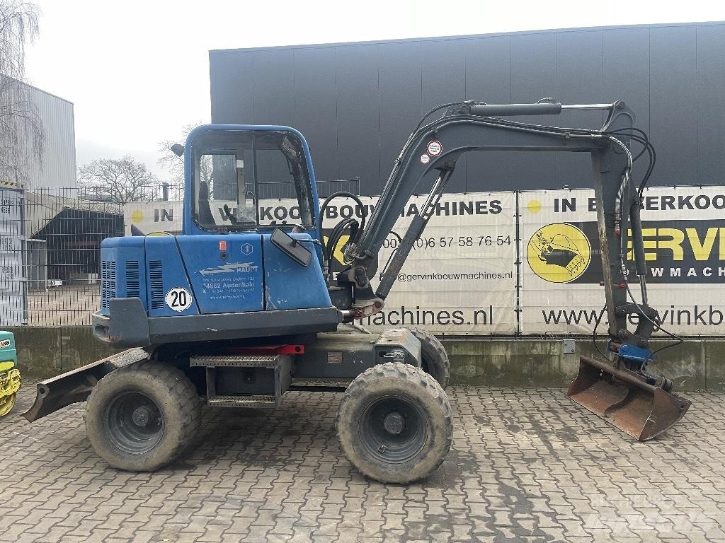  Peljop EW 256 Gumikerekes kotrók