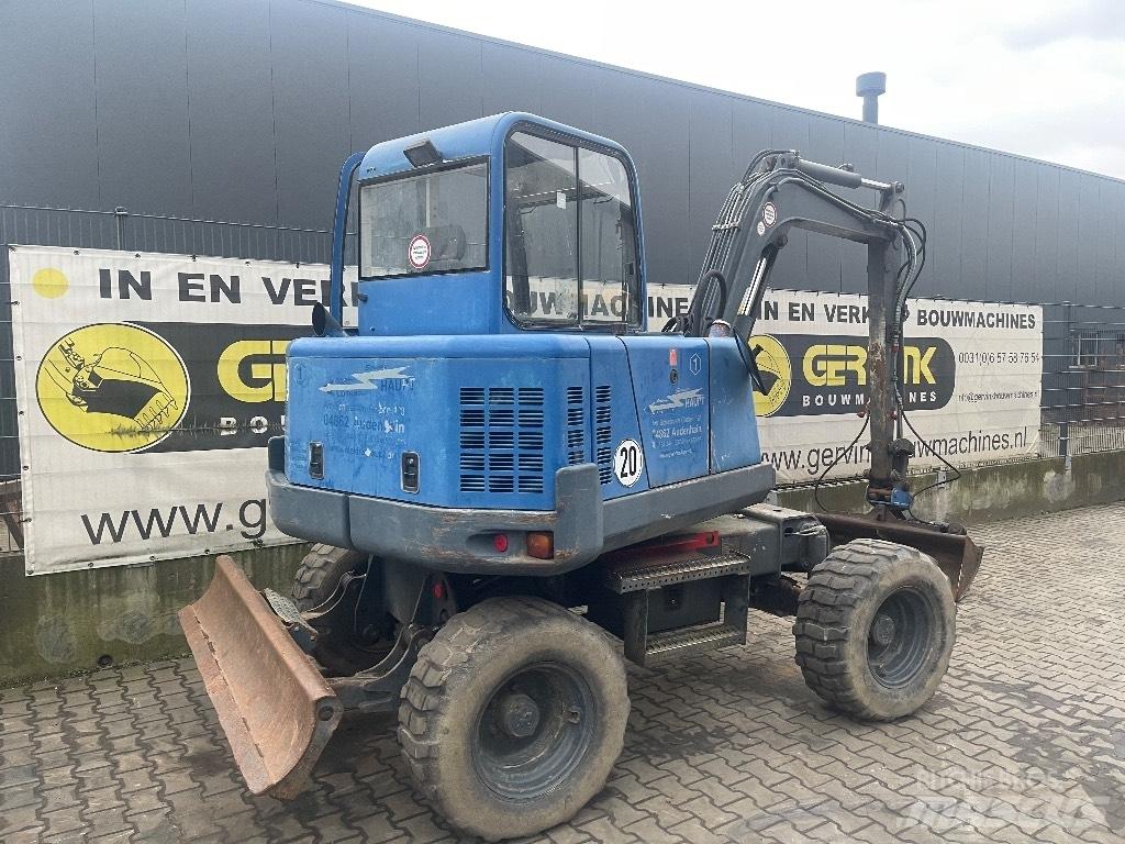  Peljop EW 256 Gumikerekes kotrók