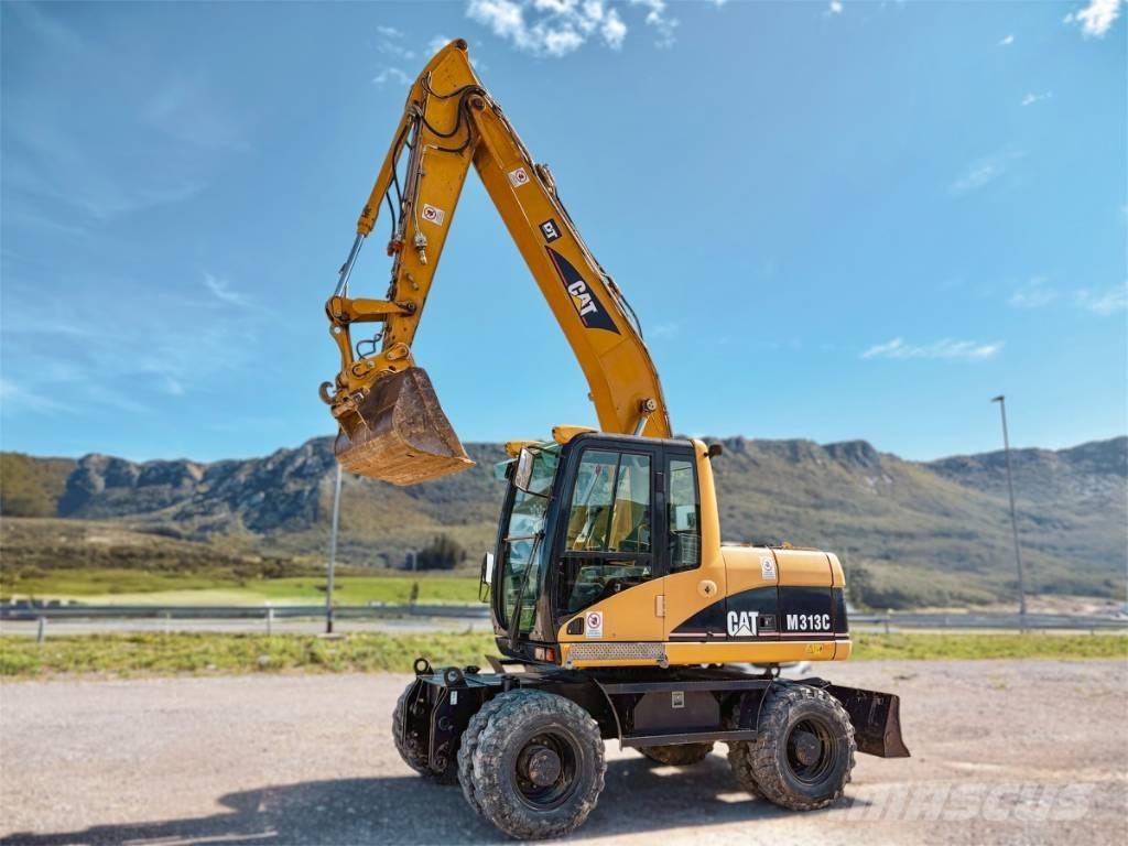 CAT M 313 C Gumikerekes kotrók