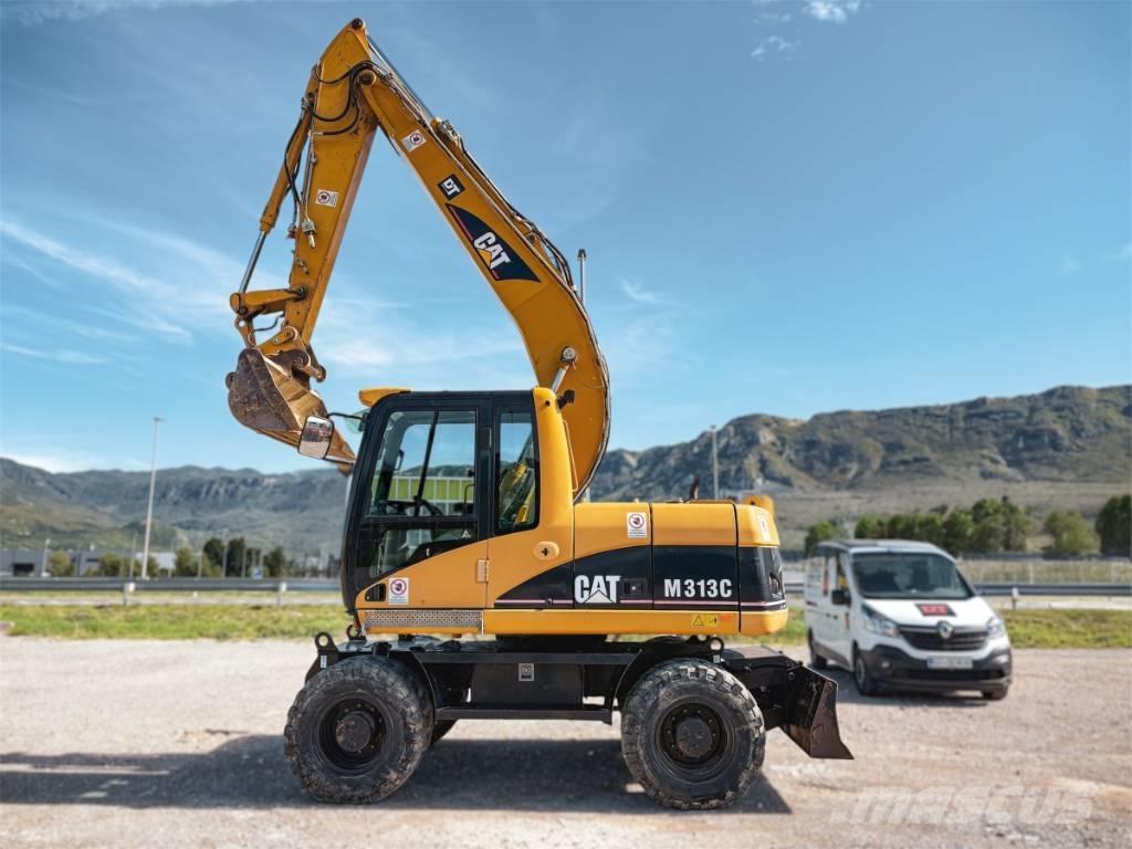 CAT M 313 C Gumikerekes kotrók