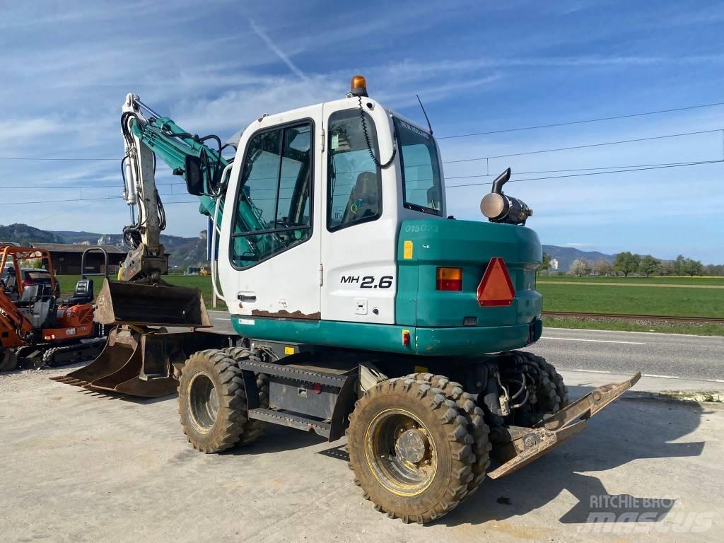 New Holland MH 2.6 Gumikerekes kotrók