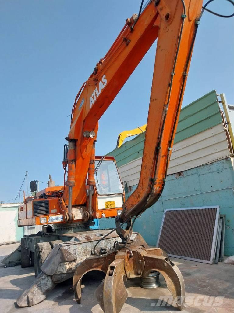 Atlas 1702 D Gumikerekes kotrók